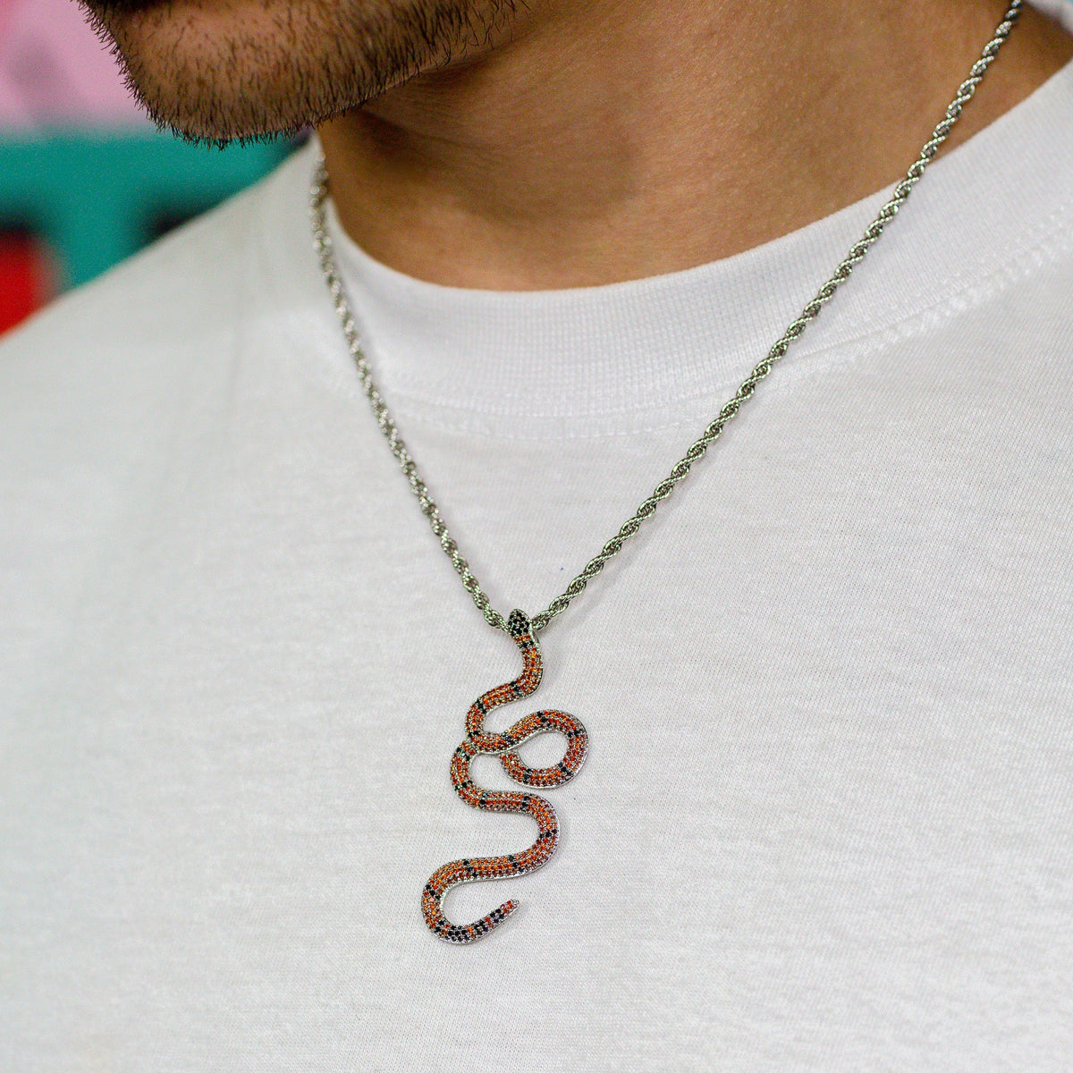 Iced Orange Snake Pendant in White Gold